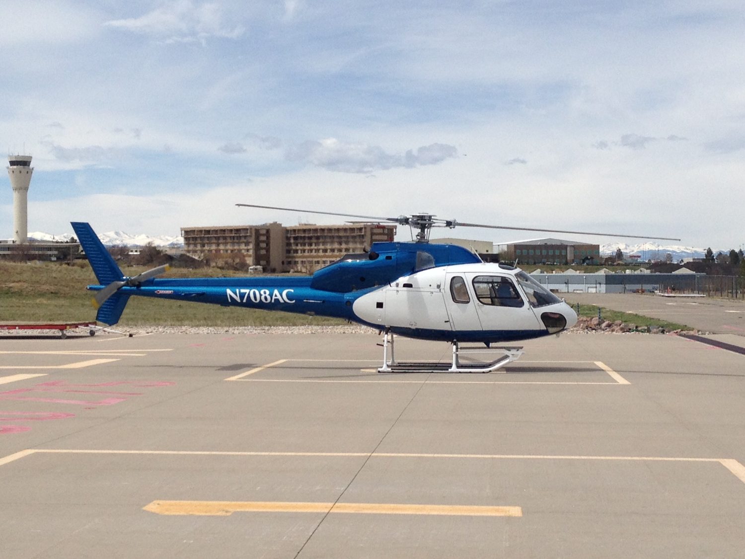 AStar on the pad with the Centennial Airport control tower behind