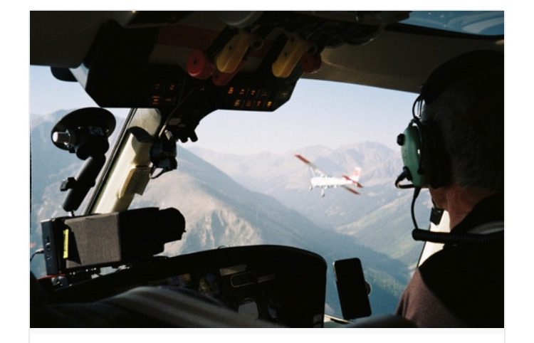 Camera mount visible from the cockpit in flight