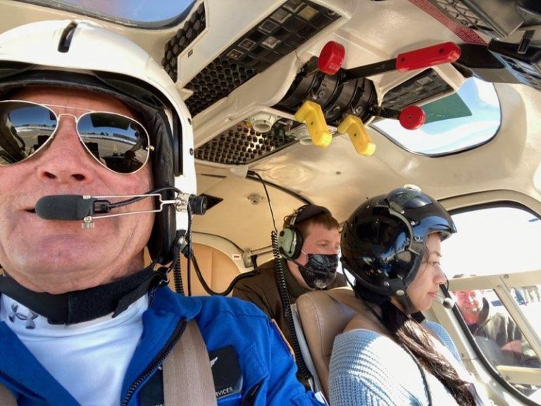 AirCam pilots in the cockpit mid-flight