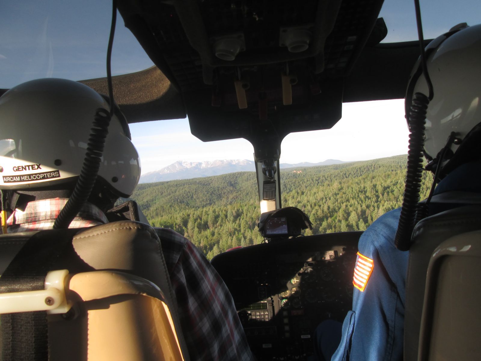Passenger view over the Colorado foothills en route to an event