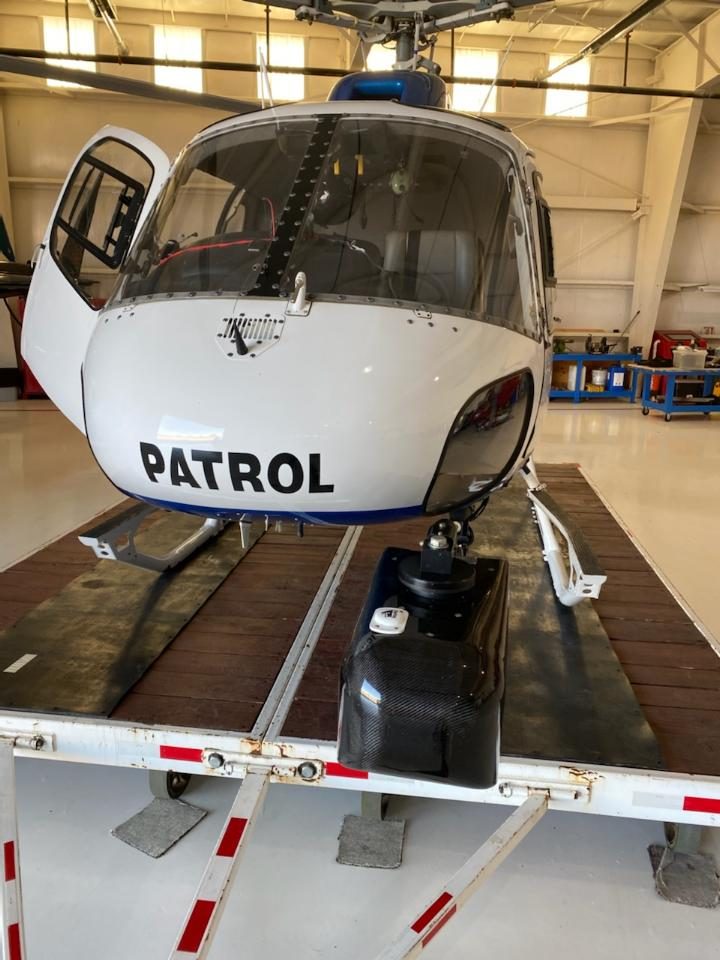 AirCam patrol helicopter loaded for transport